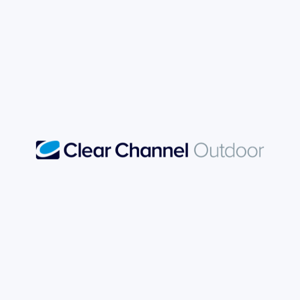 Logo of Clear Channel Outdoor with a blue and white abstract design to the left of the text.